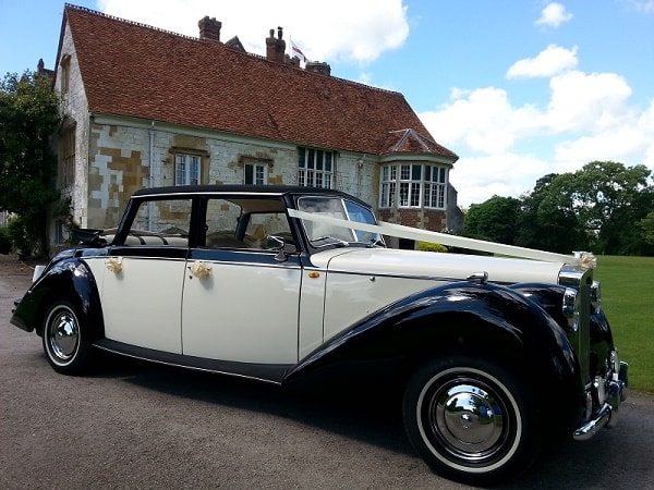 Classic Royale Windsor wedding car in ivory and black