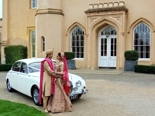 Jaguar with bride and groom