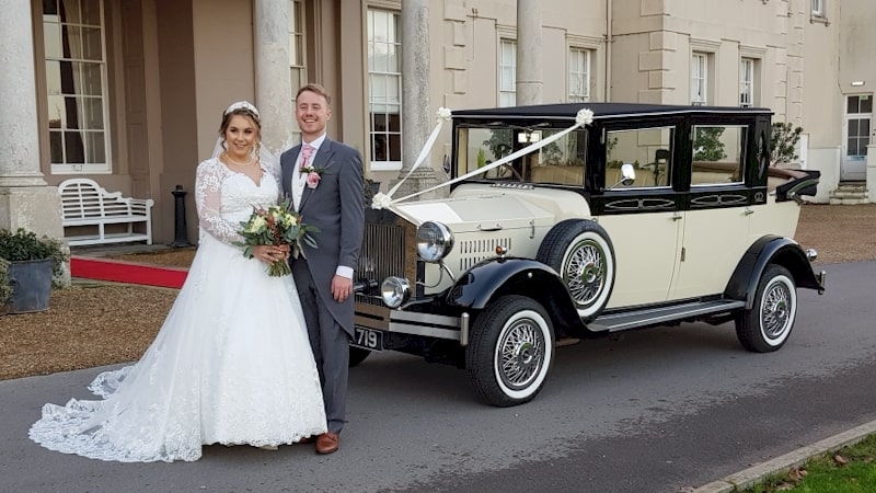 Viscount wedding limousine with the bride and groom at Wokefield Park